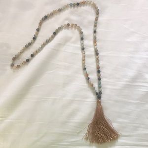 Tassel necklace.